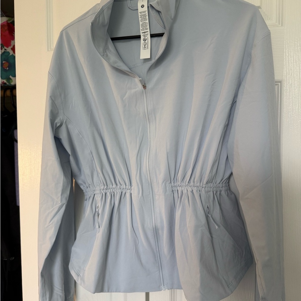 Light Blue Zip-Up Jacket - image 1